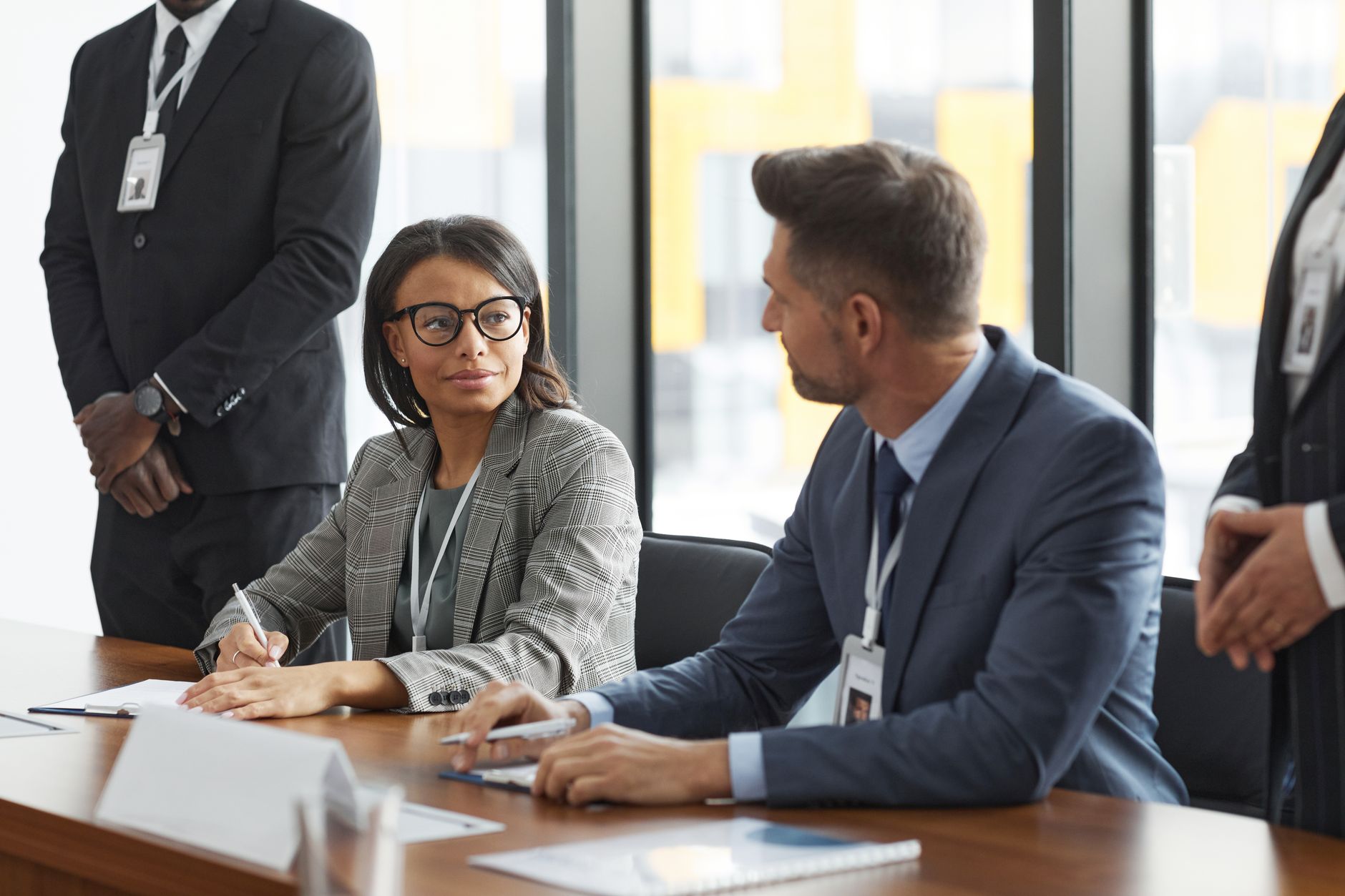 Corporate partners shaking hands reflecting strategic trust